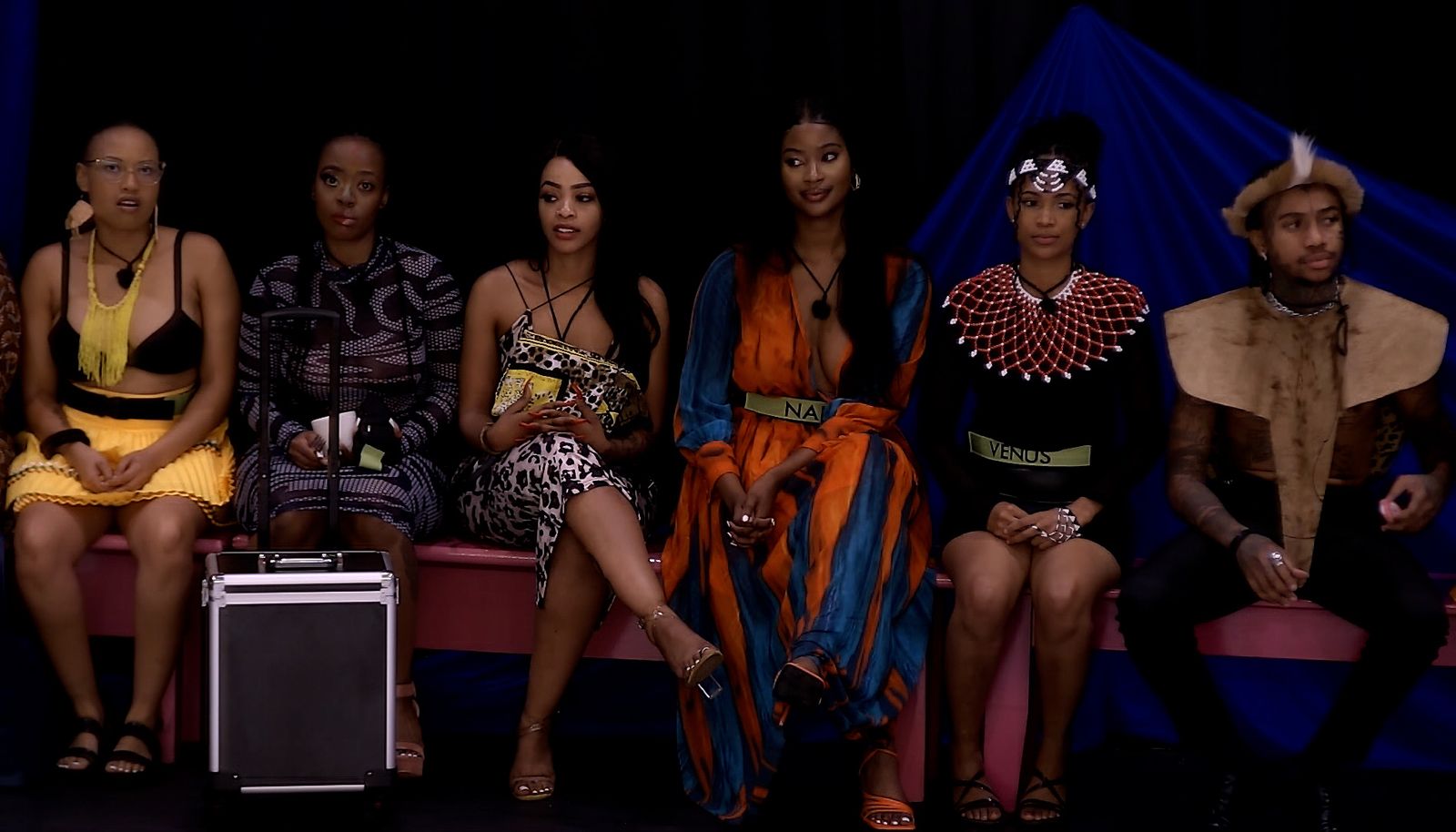 Big Brother Housemates wearing assorted traditional attire